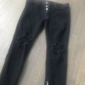 Black jeans with zipper bottom